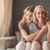 mother and daughter hugging