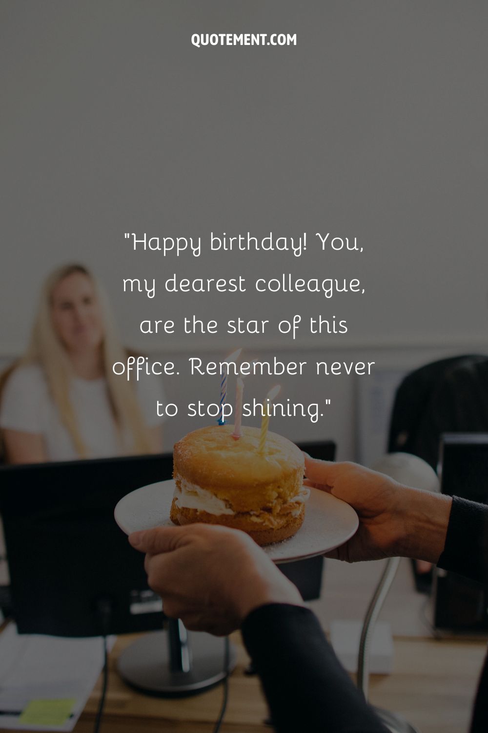 A person carrying a small cake to a blonde woman representing the sweetest birthday wish for coworker