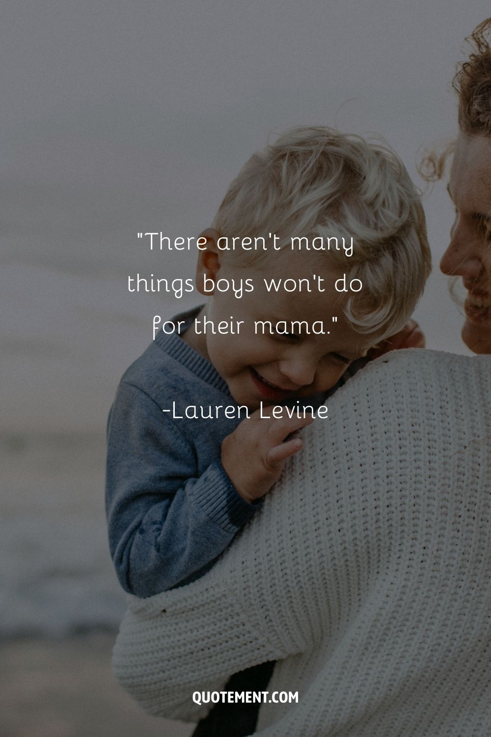 A small blonde boy leaning on the shoulder of a woman