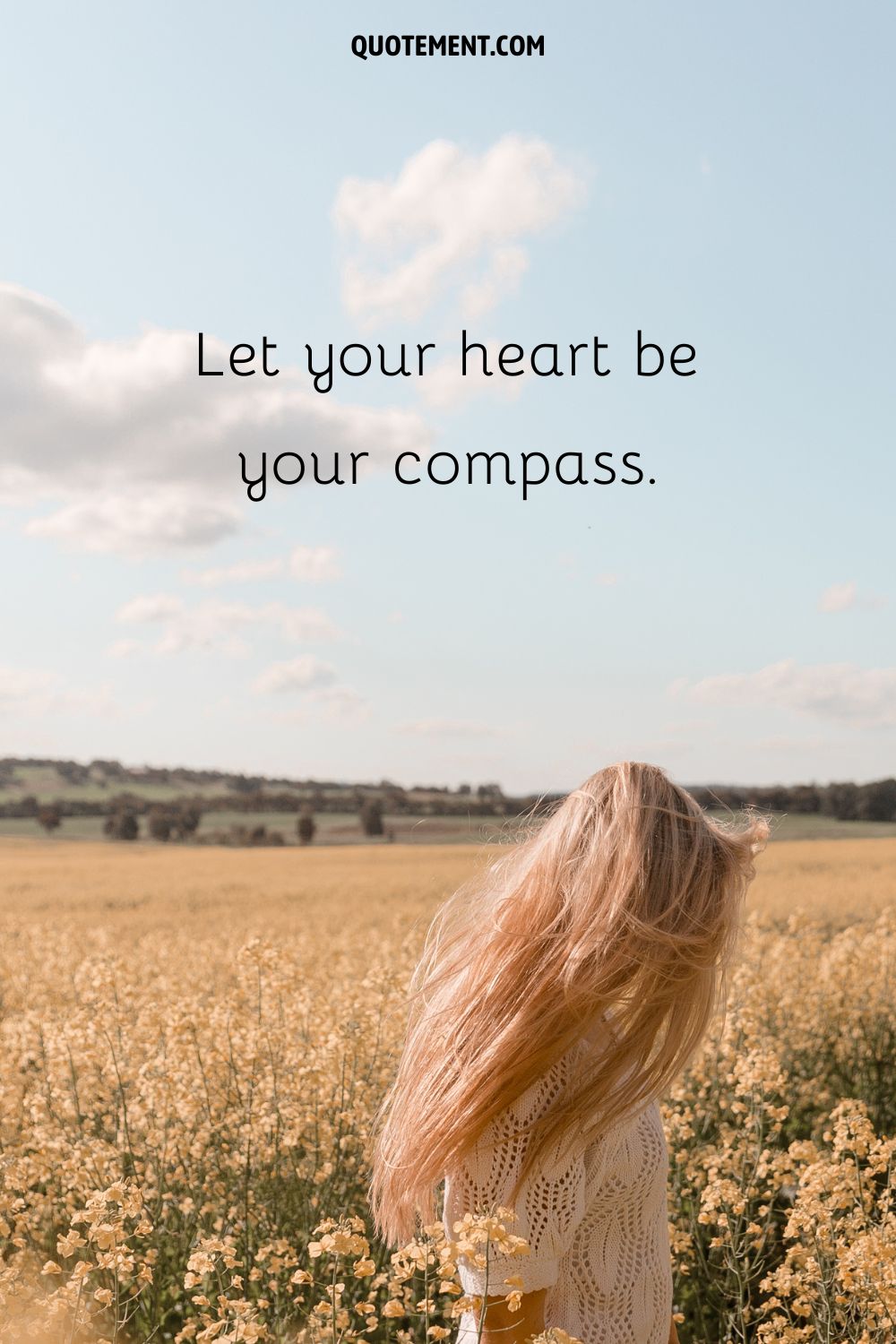 Blonde beauty amid blooming meadow representing the cutest nature caption for Instagram.