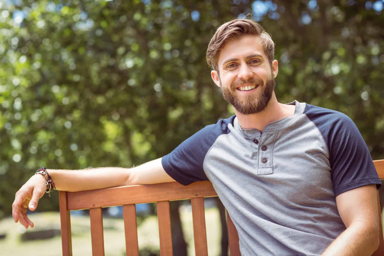 man resting on a bench