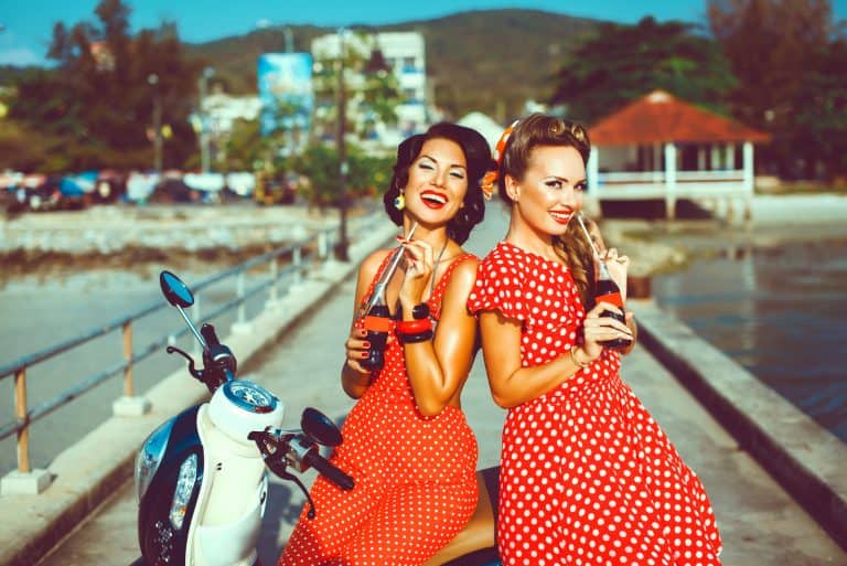 women dressed in vintage clothes