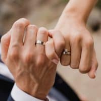 married couple with wedding rings
