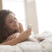 woman reading a good morning text