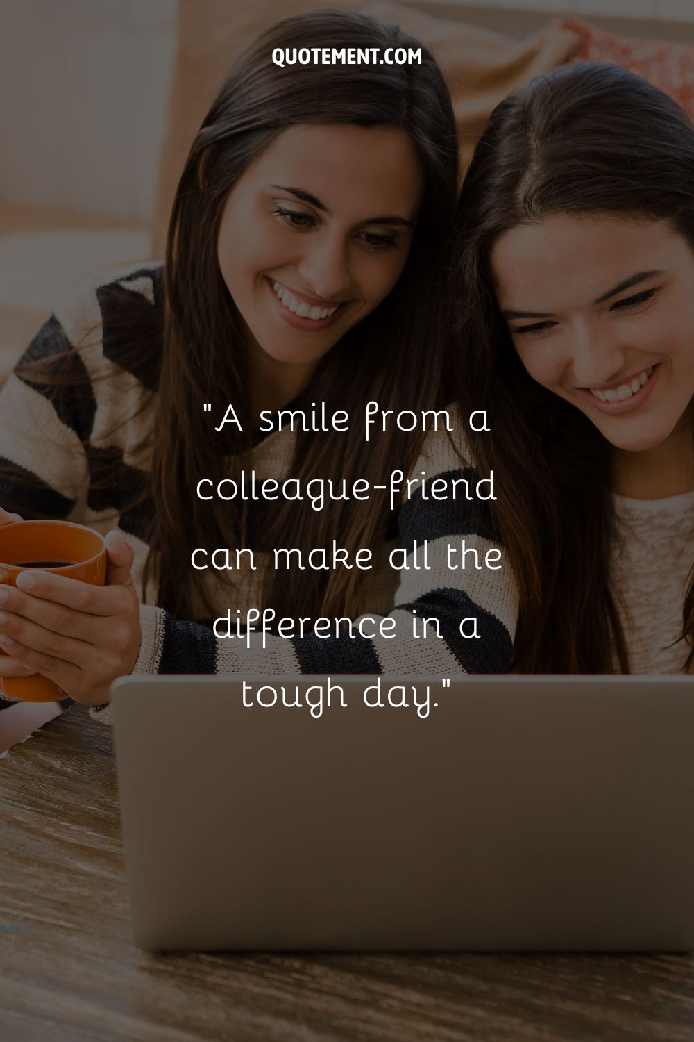 two girls laughing and looking at a macbook representing work friendship quotes
