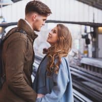 young couple at a station