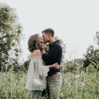 couple kissing in nature