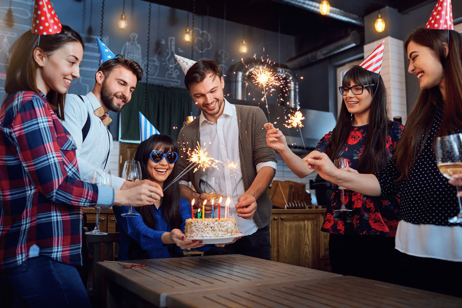 a woman celebrates her birthday with friends