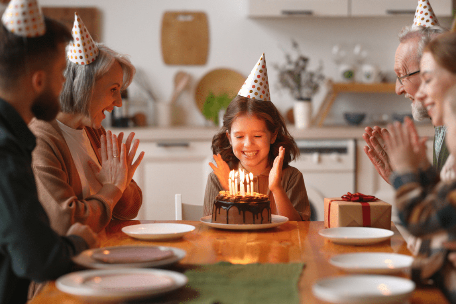 the girl celebrates her 12th birthday with her family