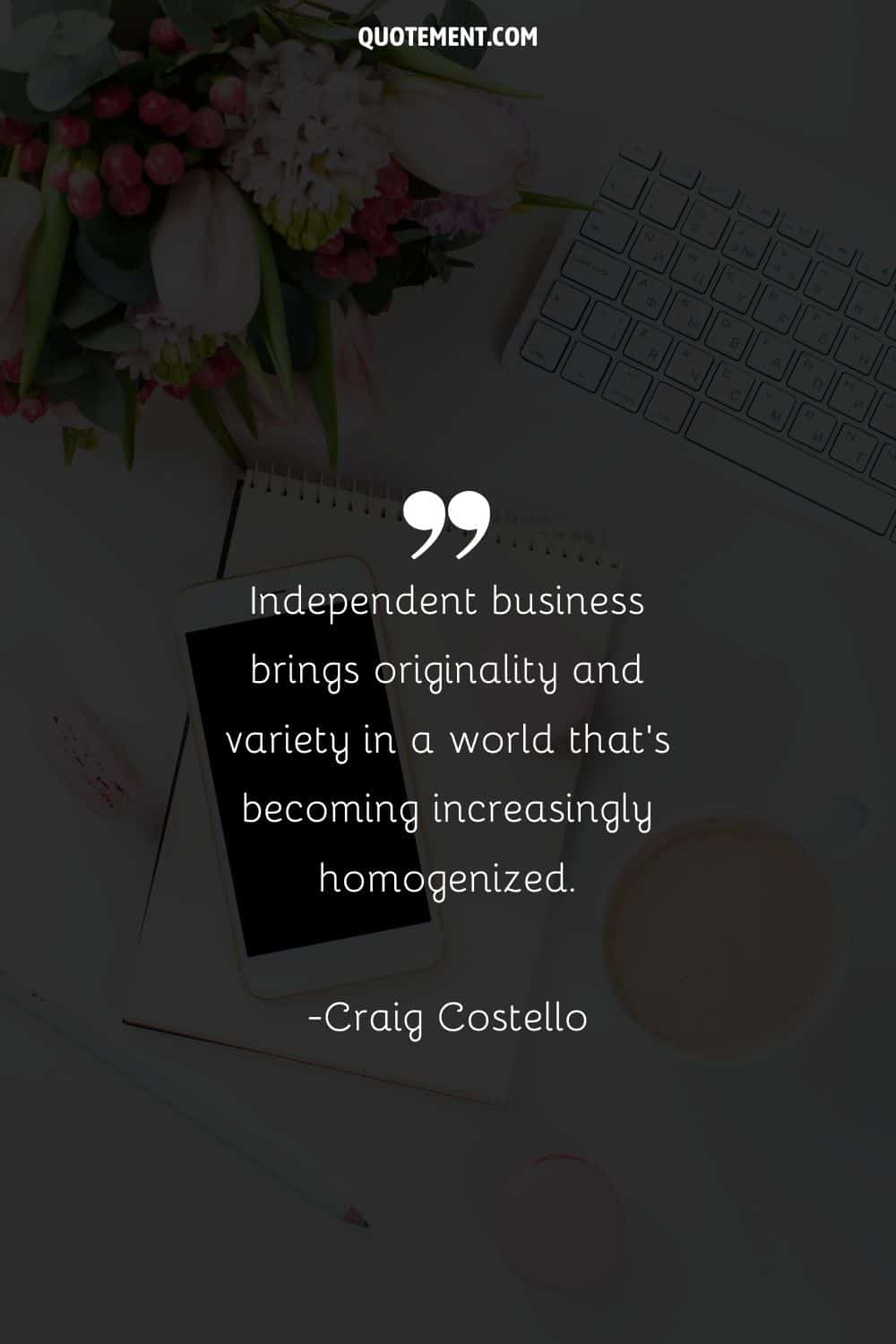 Quote for small business and office desk in the background.