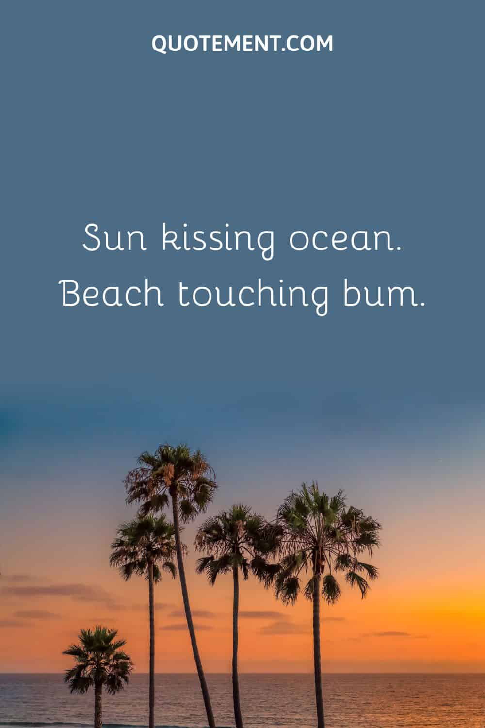 Sun kissing ocean. Beach touching bum