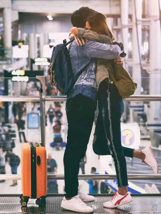 couple hugging at airport