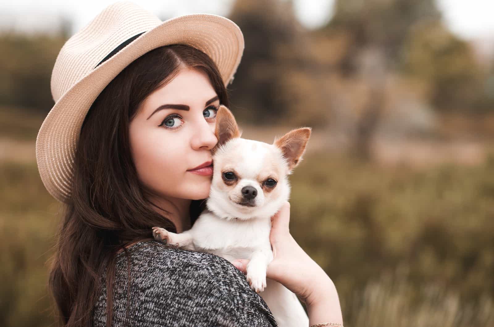 woman with a chihuahua