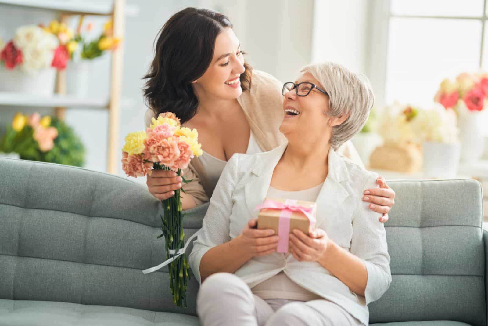 smiling woman with her mother in law for her birthday