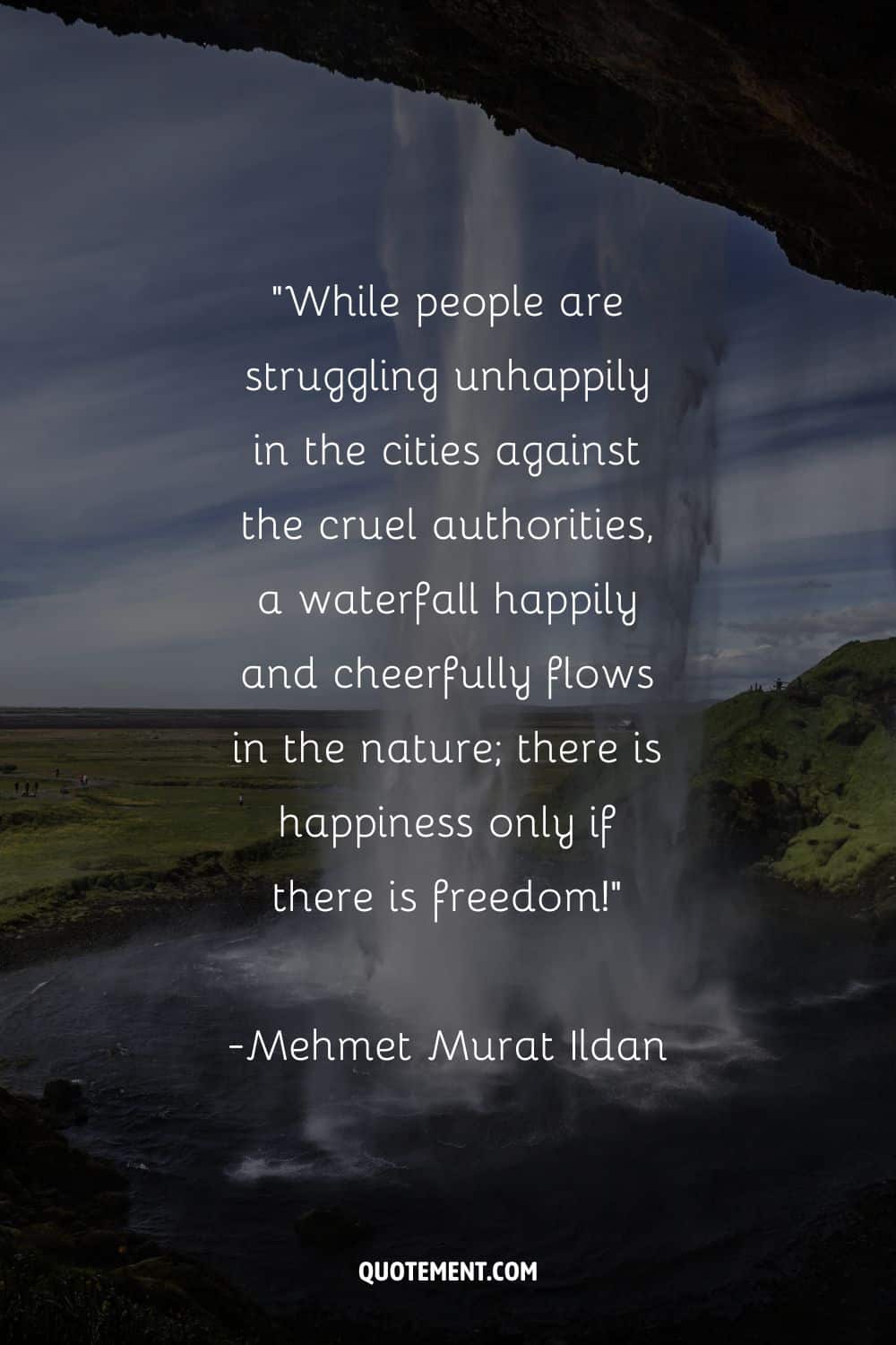Mehmet Murat Ildan on happiness, freedom and waterfalls, and a waterfall in the background
