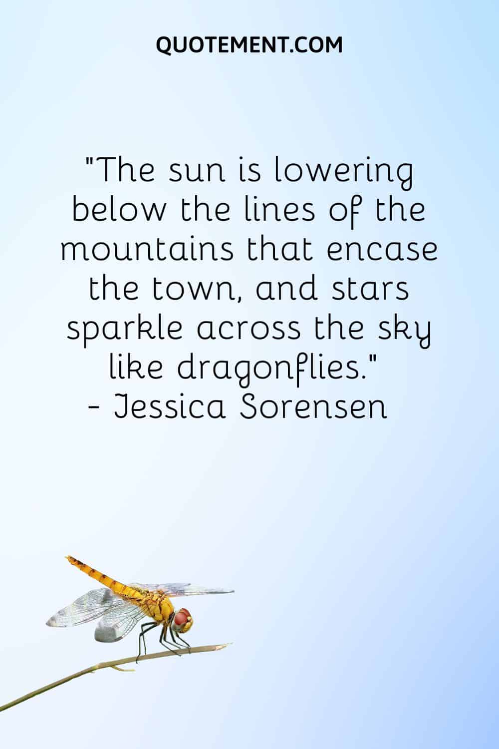 The sun is lowering below the lines of the mountains that encase the town, and stars sparkle across the sky like dragonflies.