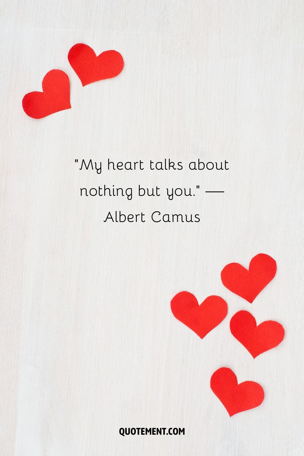 A white canvas embraces six heartfelt red hearts.