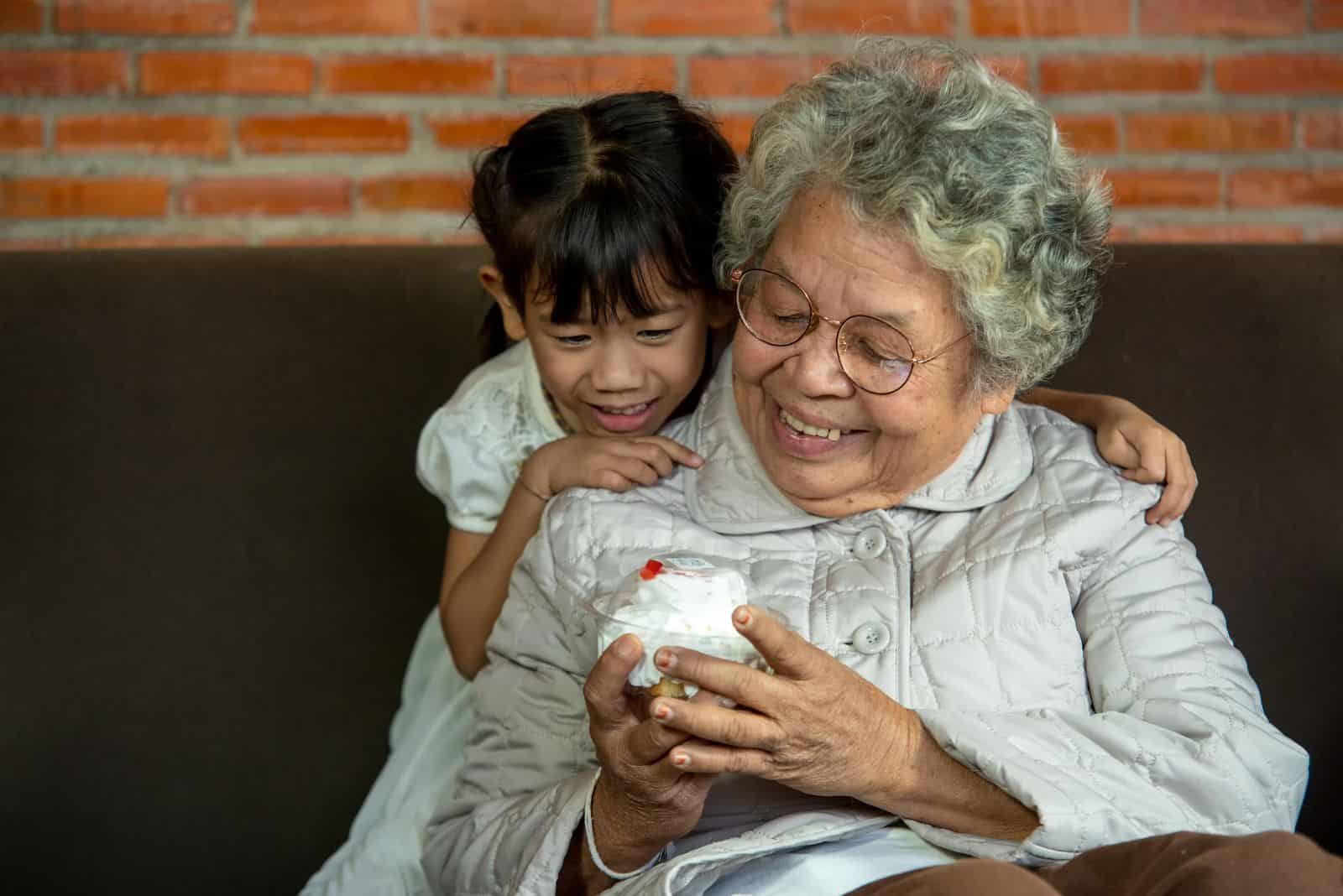 grandmother celebrates her birthday with her grandson