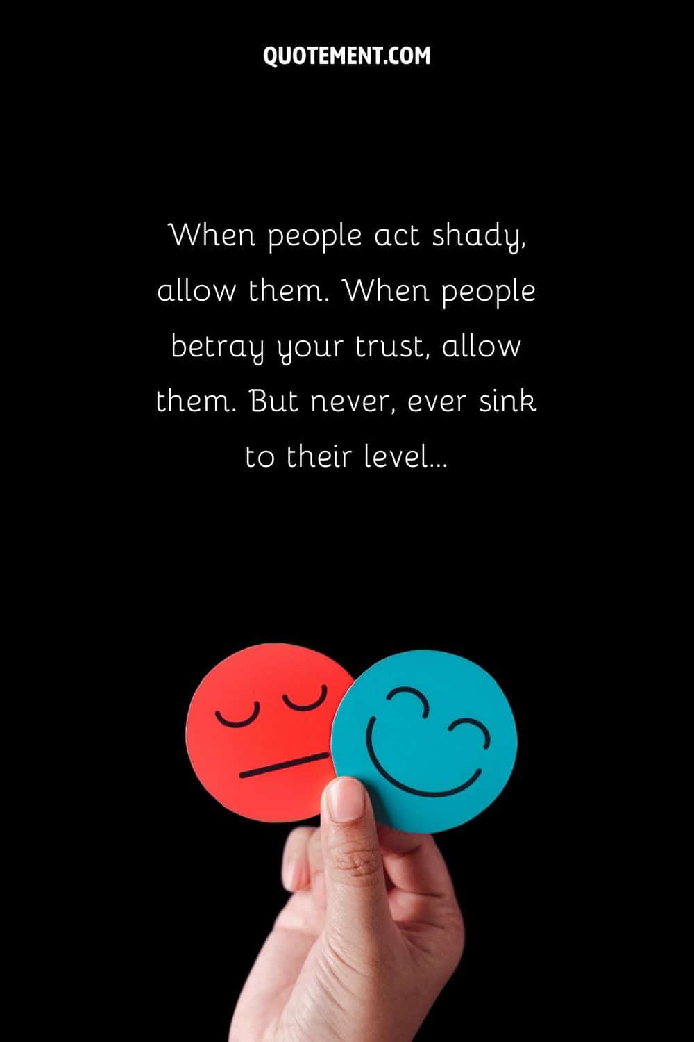 happy and sad emojis in a hand image representing inspirational quote about fake people using you