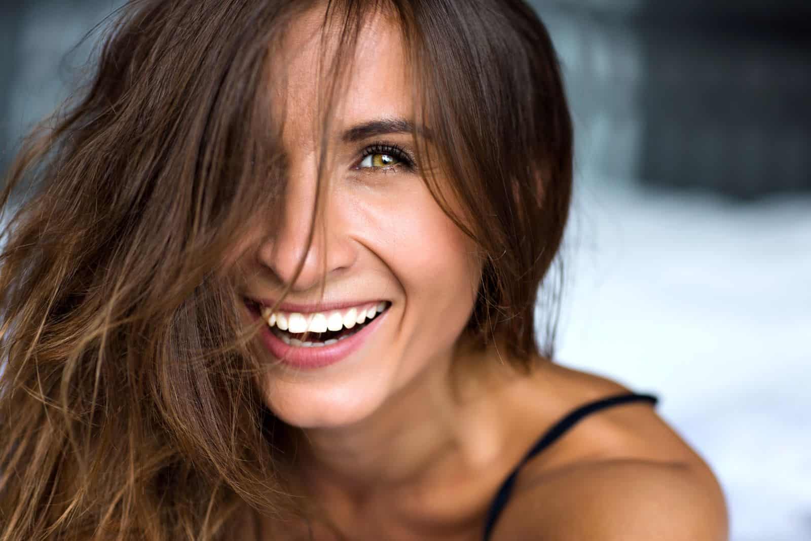 smiling girl with brown hair