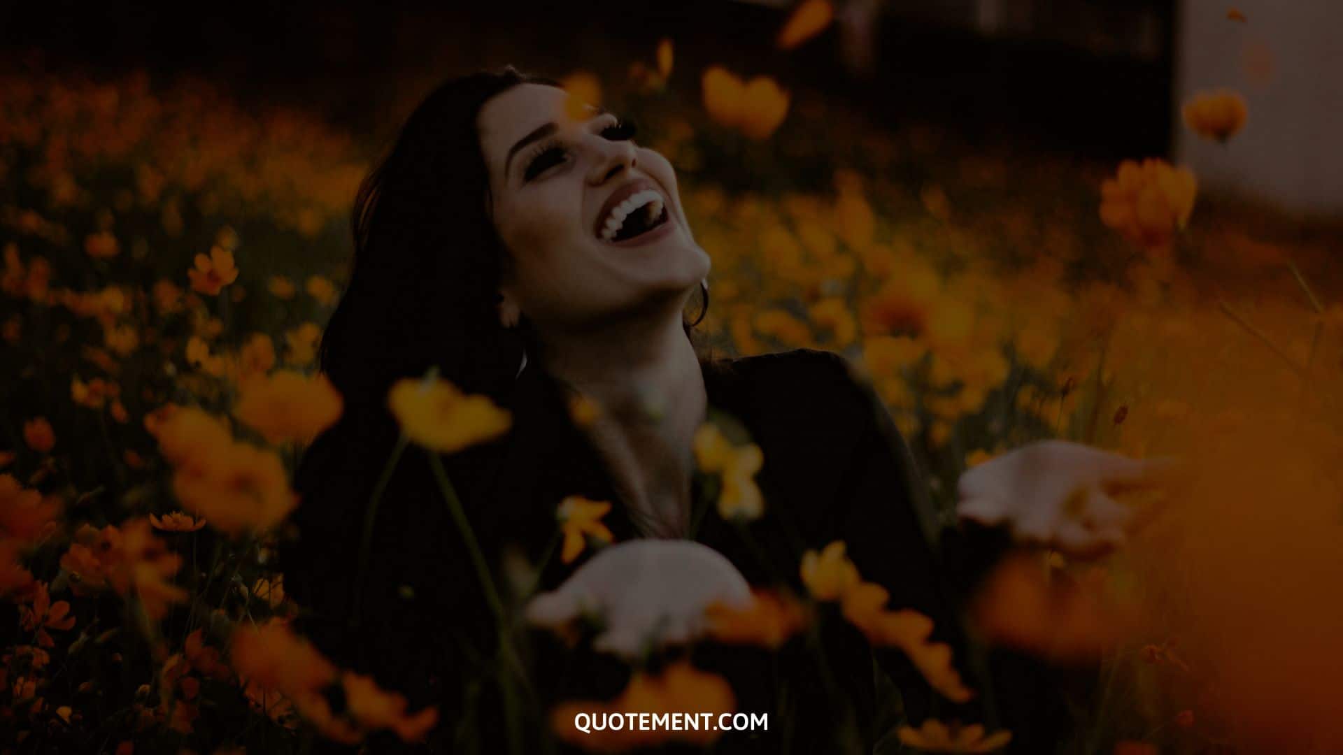 happy woman throws leaves and laughs, concept of joy