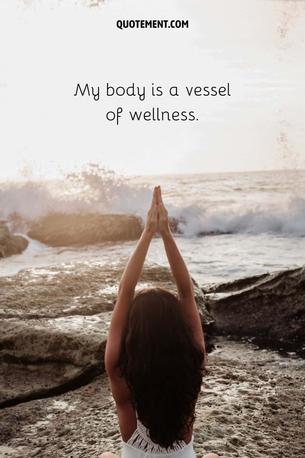 a woman at the beach image representing body affirmation of the day