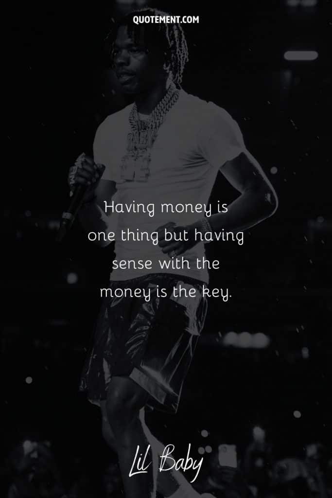 artist performing in shorts image representing lil baby money quote