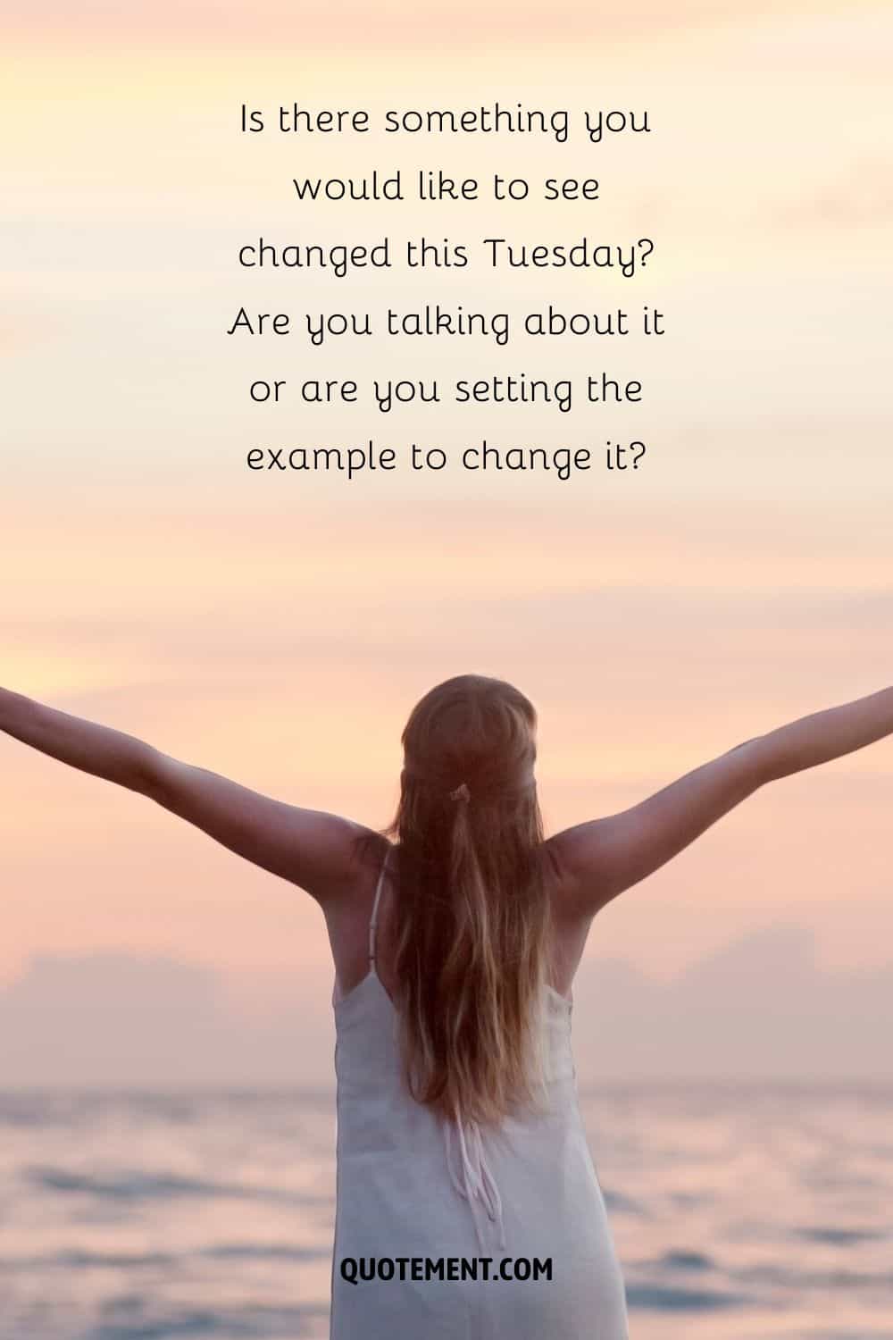 woman with raised hands image representing encouraging transformation Tuesday quote