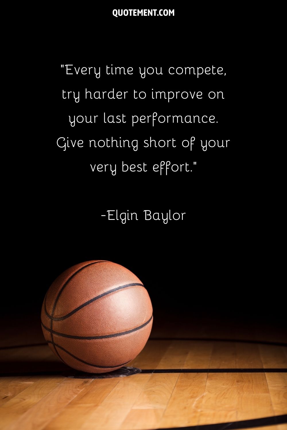 Ball sits still on the parquet representing try your best quote.
