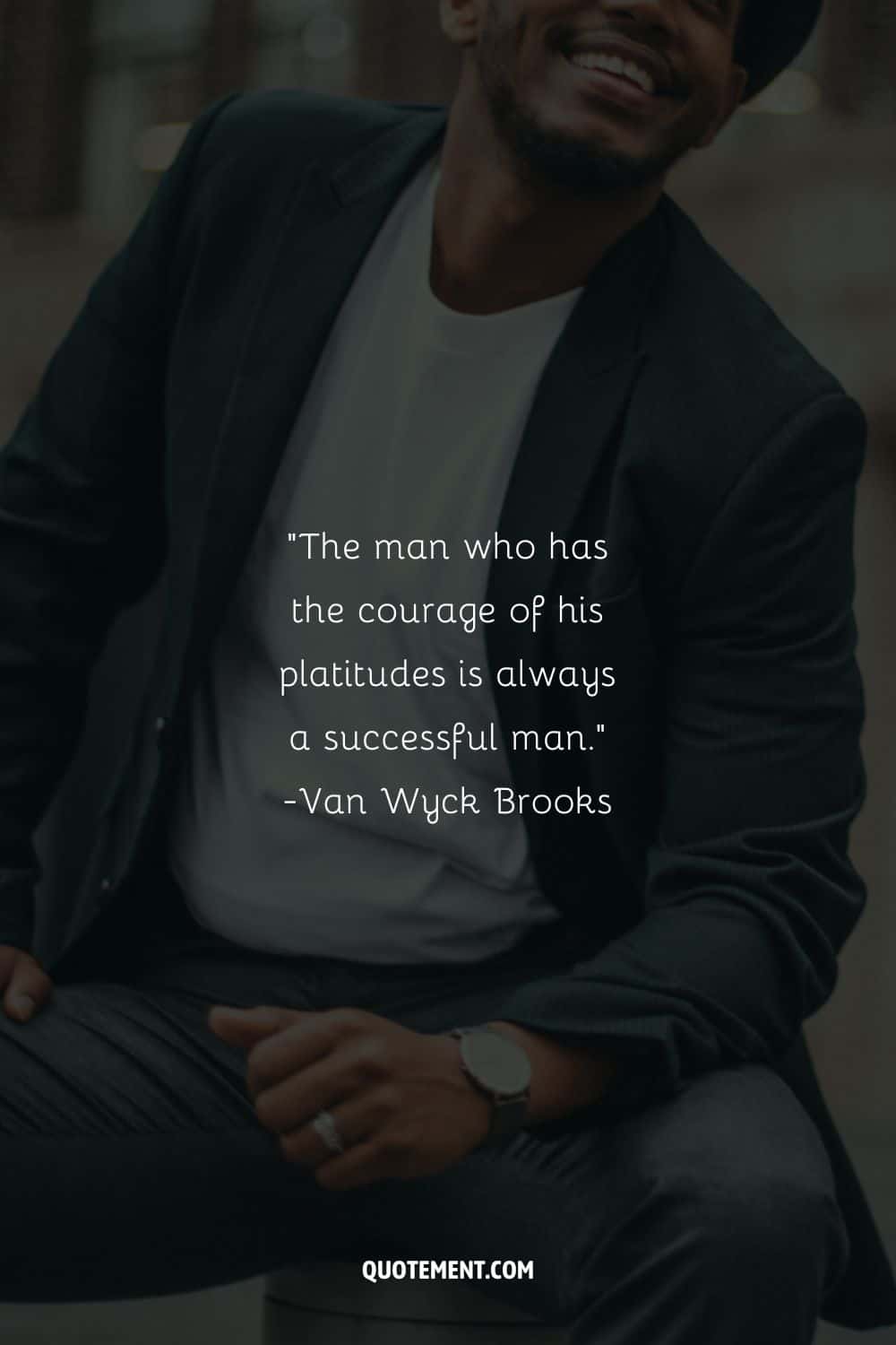 a man smiling representing uplifting quote for men of success