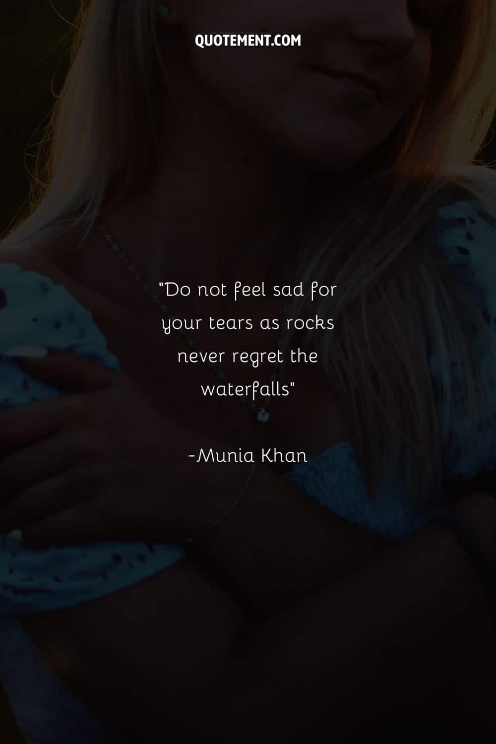 A woman with golden locks and white manicured nails representing a quotation about regret