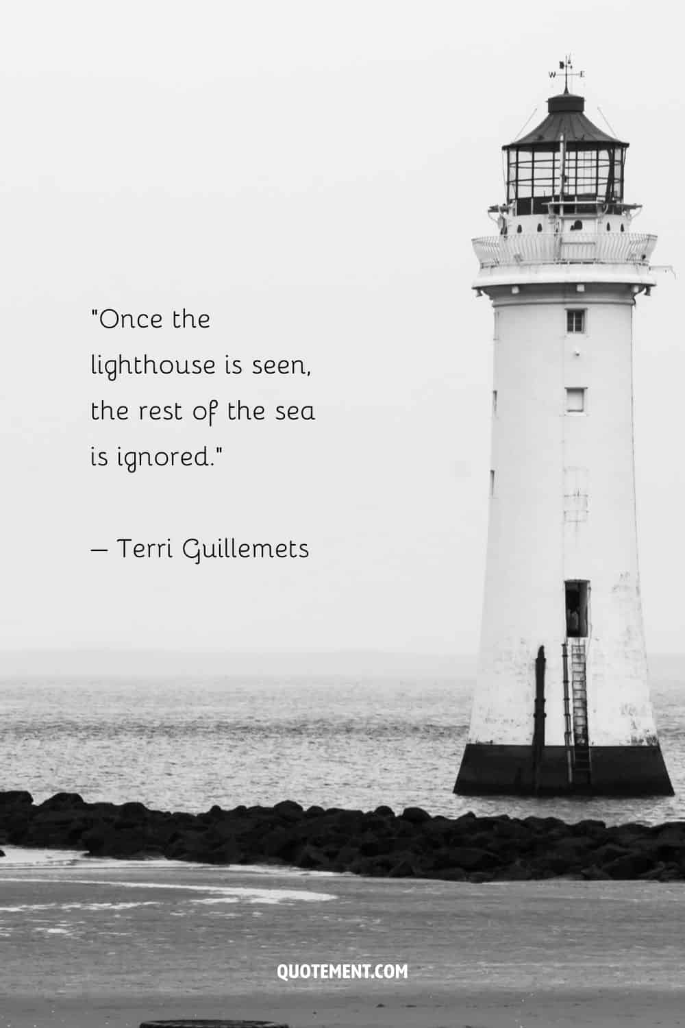 Deep quote by Terri Guillemets and a lighthouse in black and white