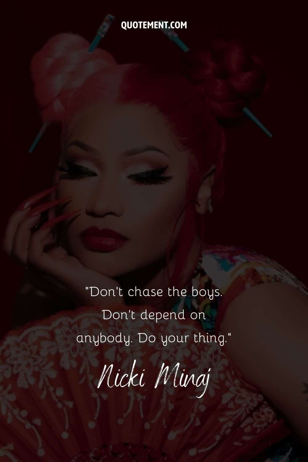 Motivational quote by the female rapper Nicki Minaj and her photo in the background