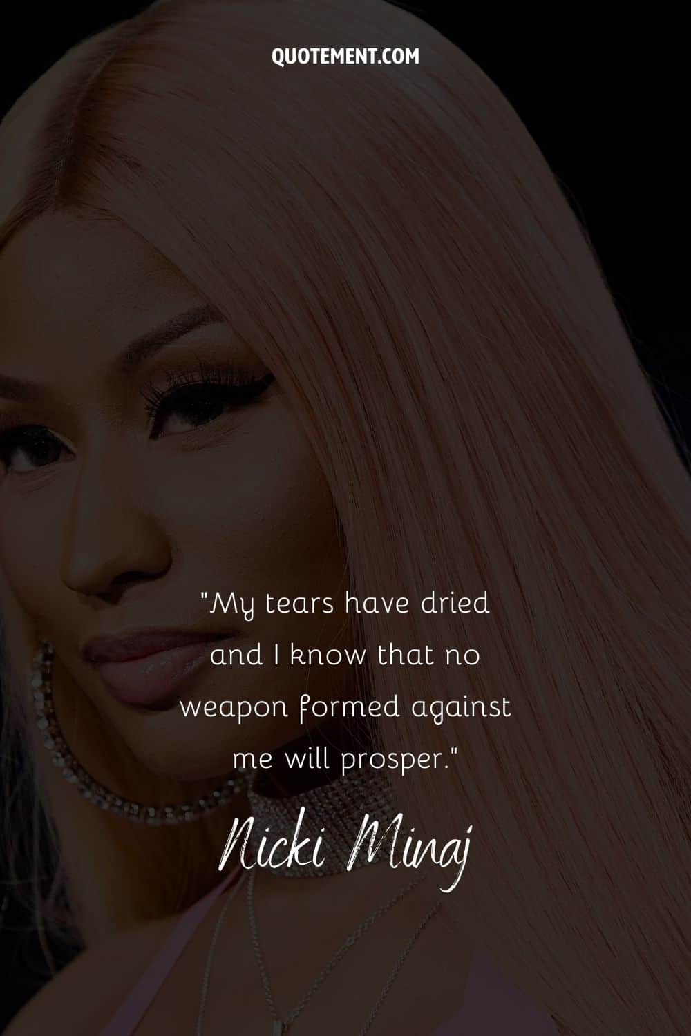 Sassy quote by the female rapper Nicki Minaj and her photo in the background as well