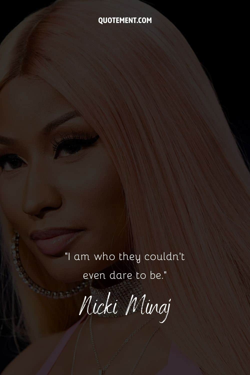 Sassy quote by the rapper Nicki Minaj and her photo in the background