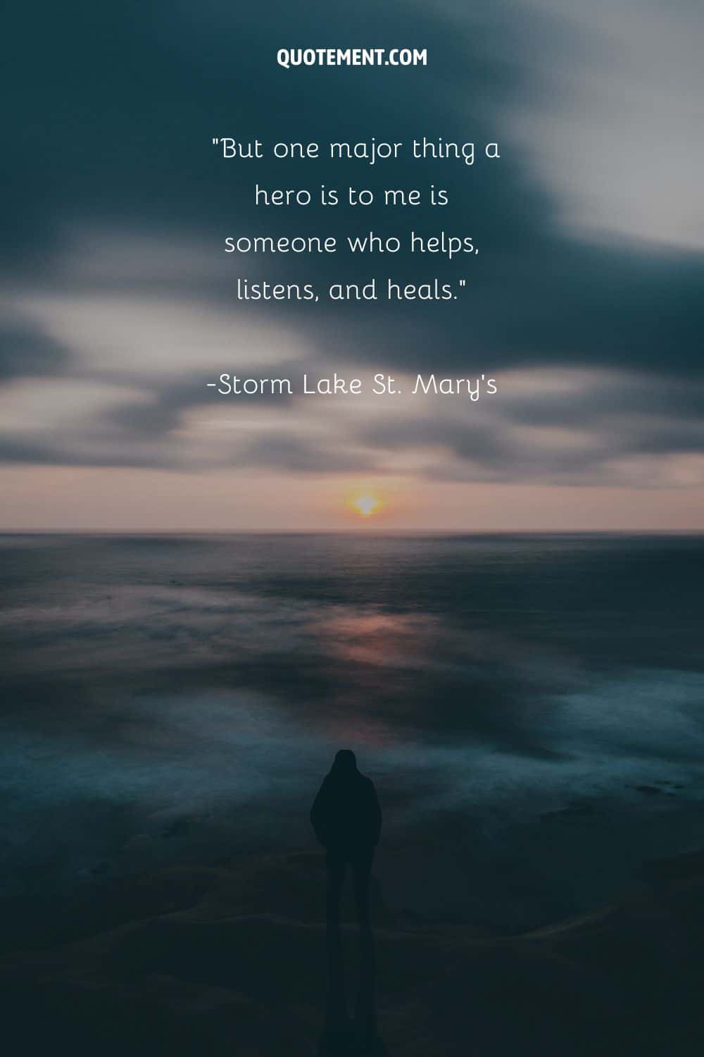 a guy observing the sunset at the beach representing quote about being a real hero