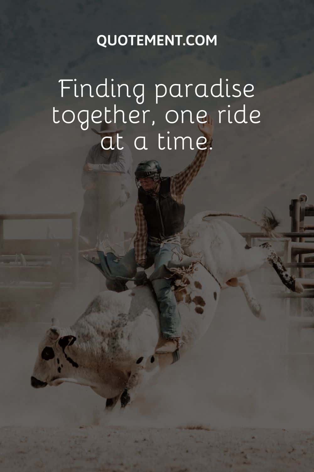 a guy with a raised hand riding a white rodeo bul
