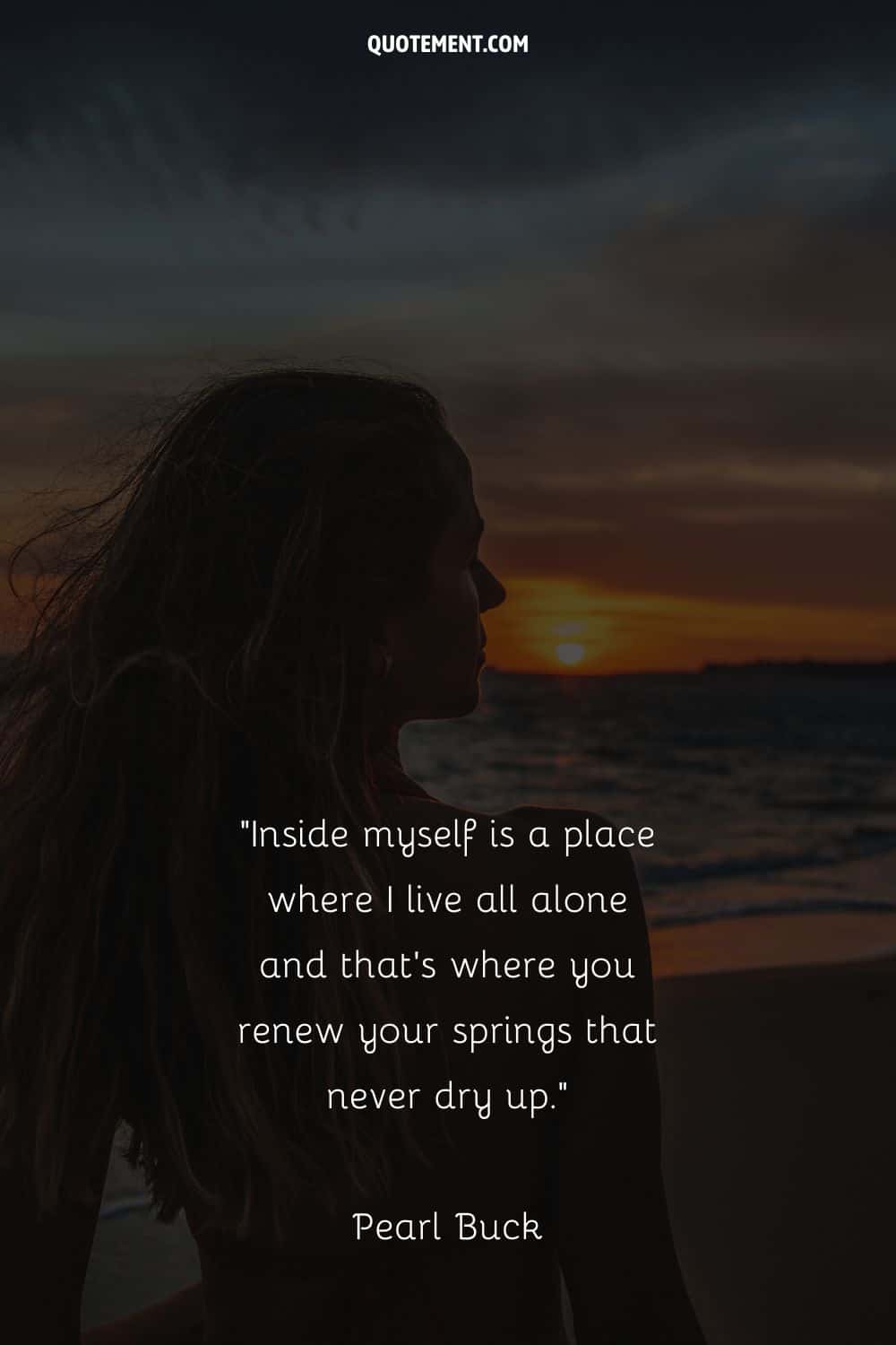 a woman at the beach representing empowering loneliness quote
