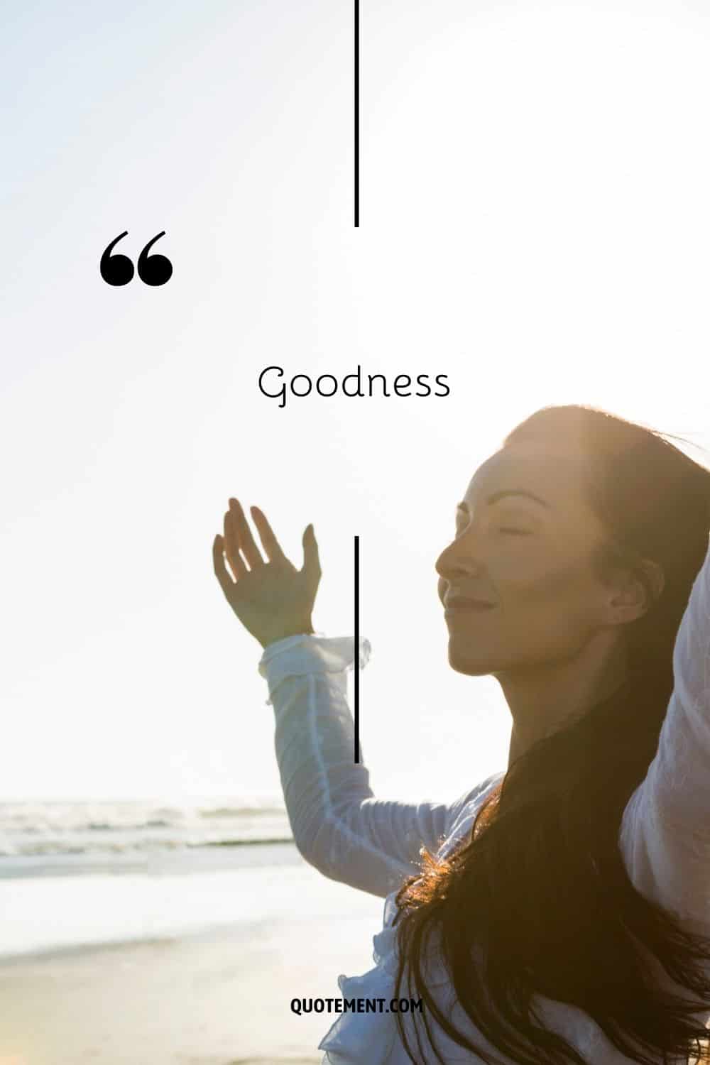 a woman with closed eyes at the beach representing the word goodness