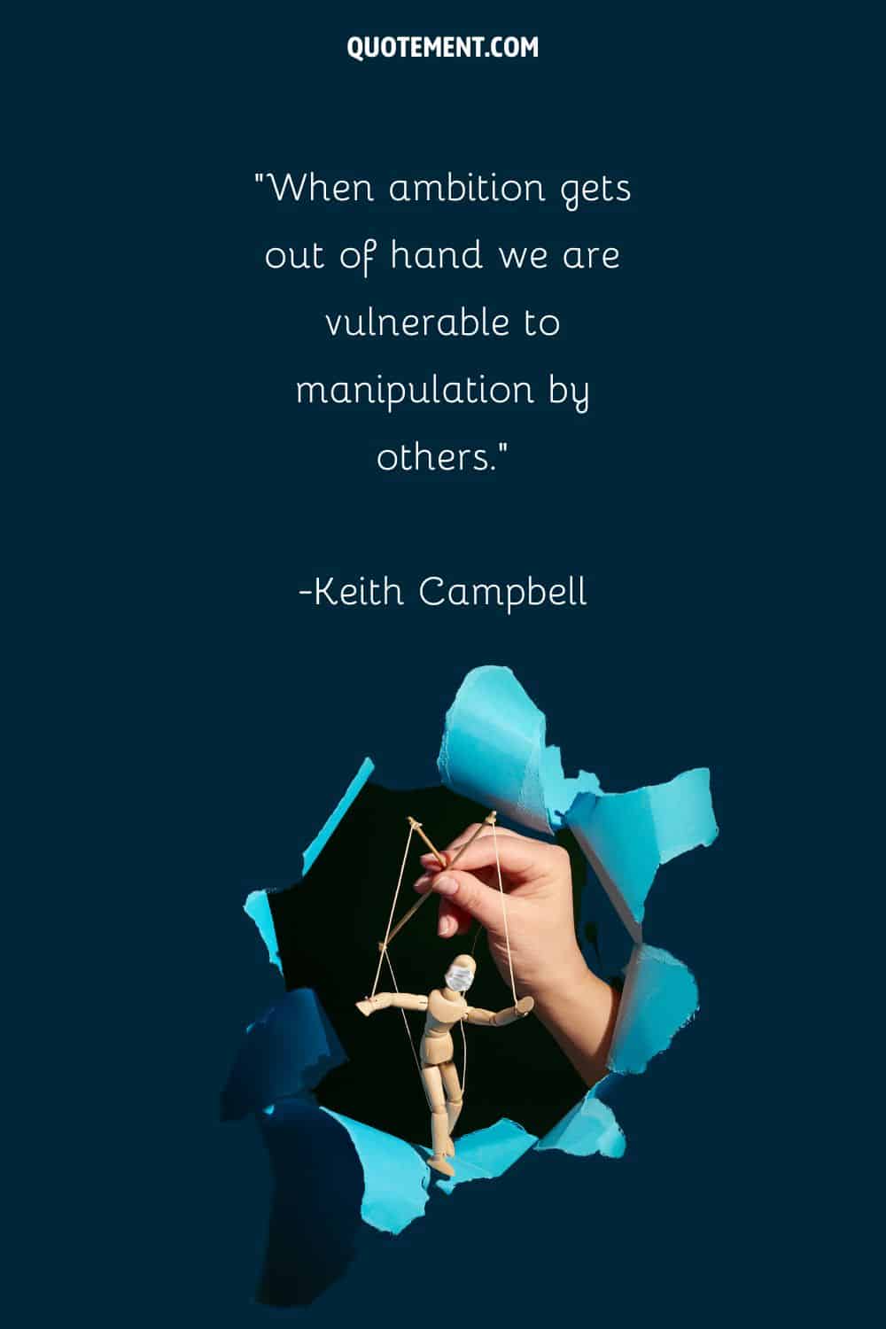 hand holding a string puppet representing quote on manipulation