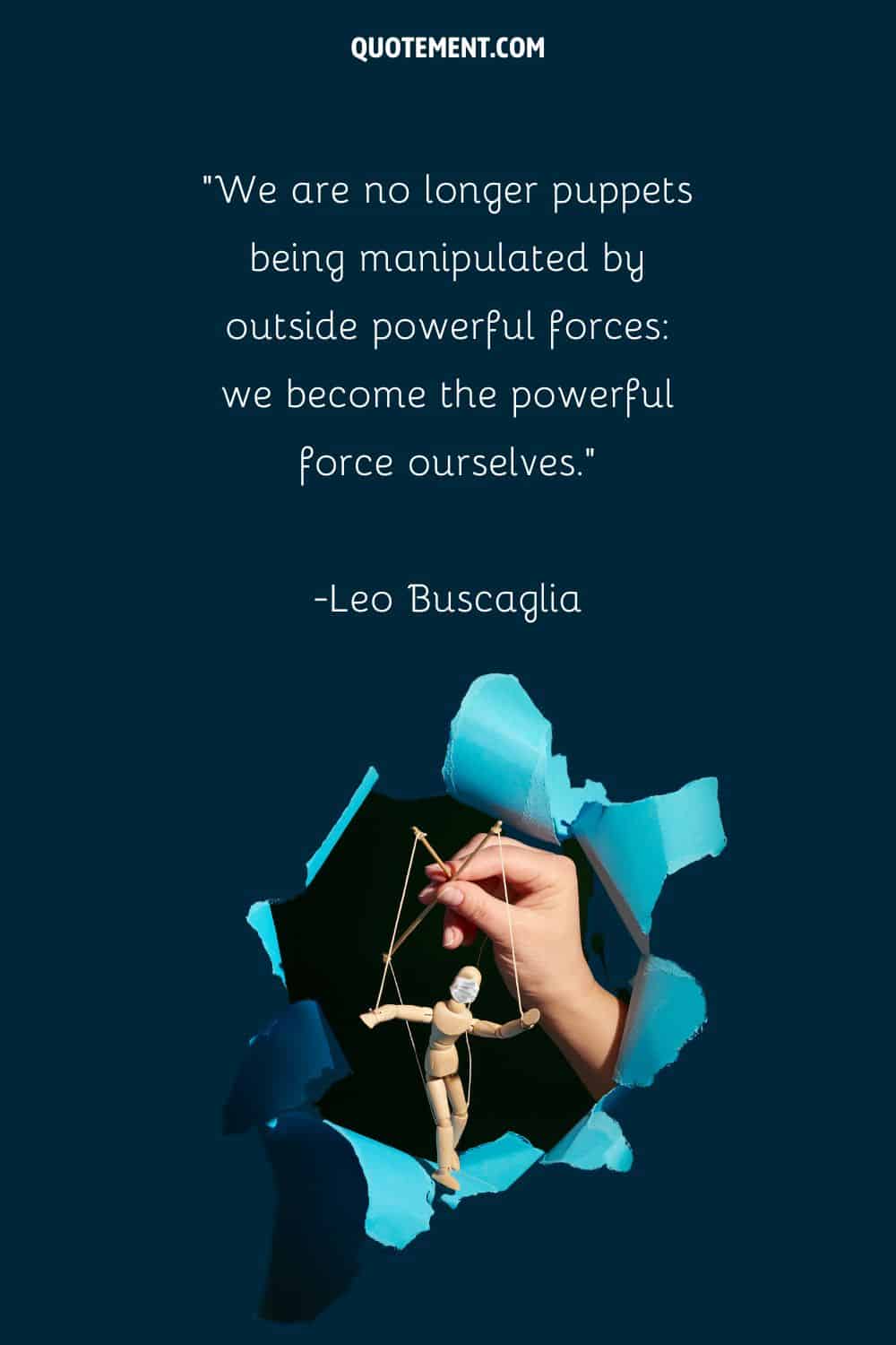 puppet in a hand representing quote on manipulation
