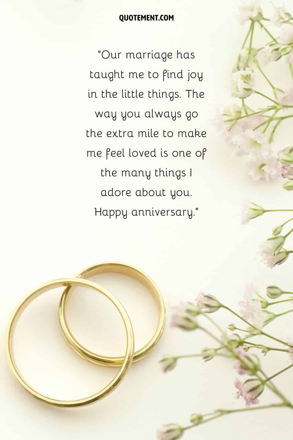 white flowers and wedding anniversary rings representing anniversary quote for your wife