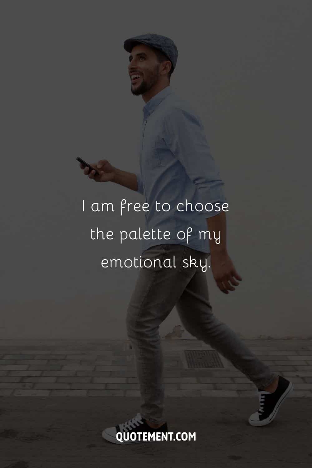 A happy man strolling with phone in hand representing positive affirmation for Friday.
