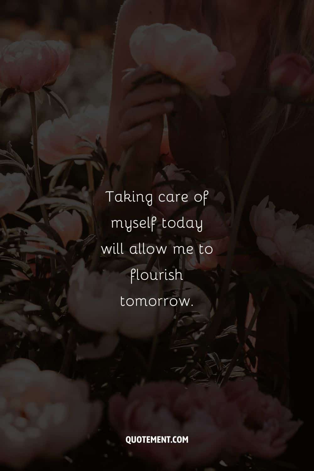 A woman surrounded by flowers image representing a self-care affirmation