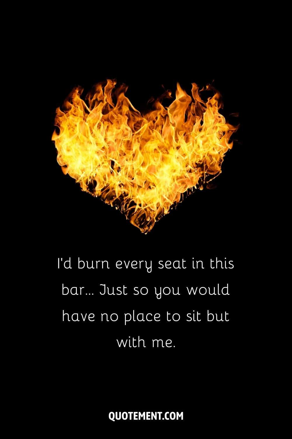 fire in shape of heart on a black background