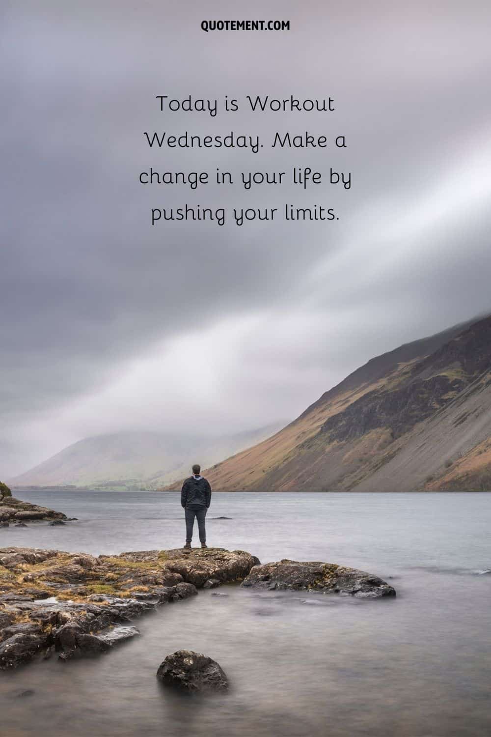 man standing on water stone surrounded by nature representing Wednesday workout quote