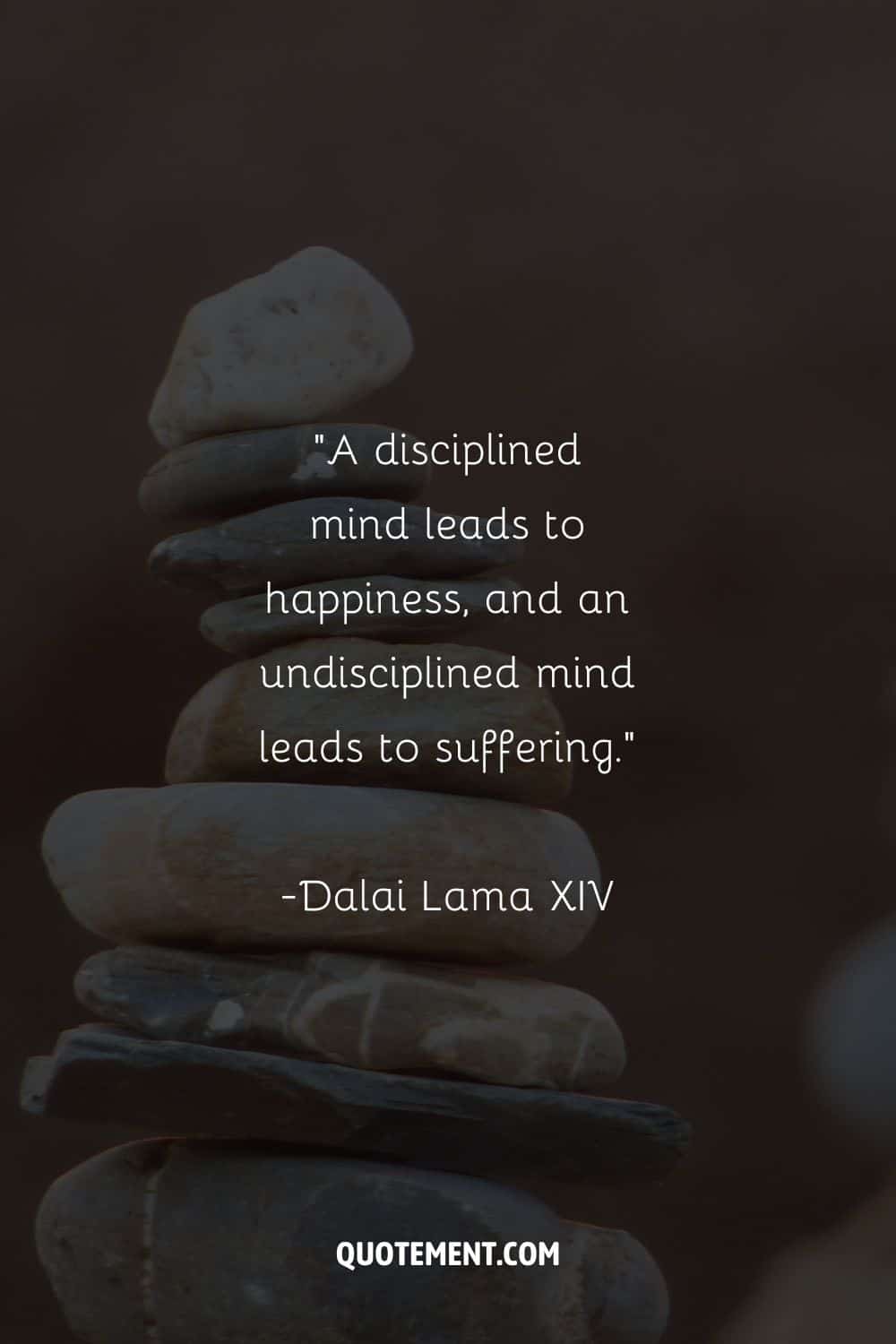 rocks stacked representing discipline quote