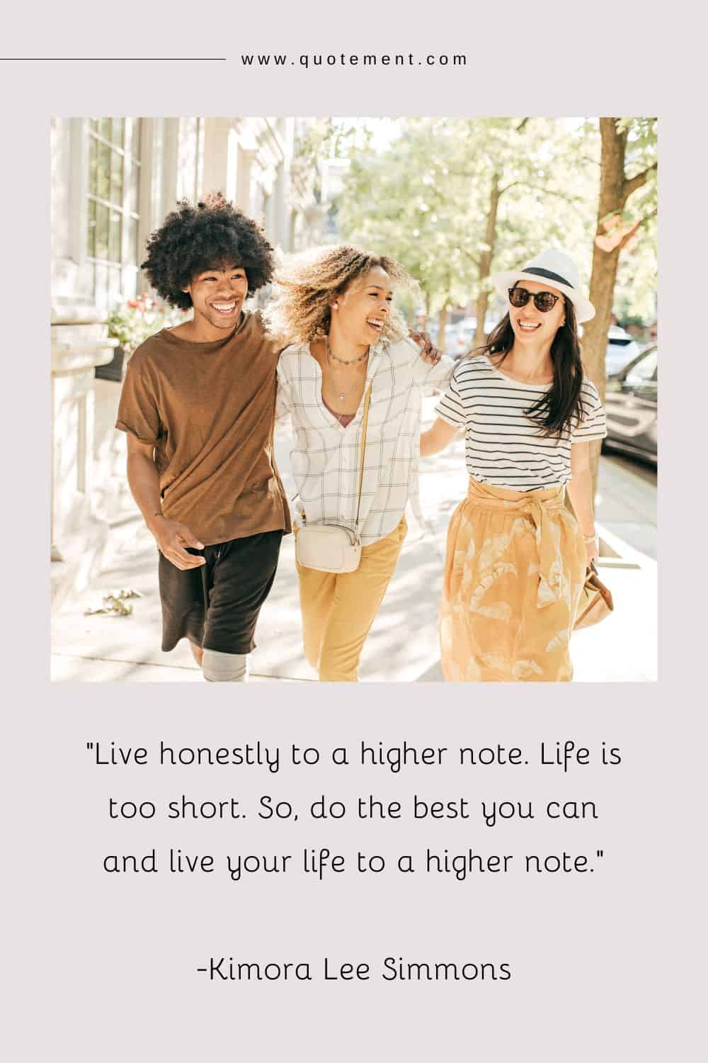 three smiling friends in a group hug walking down the street representing inspiring life's too short quote