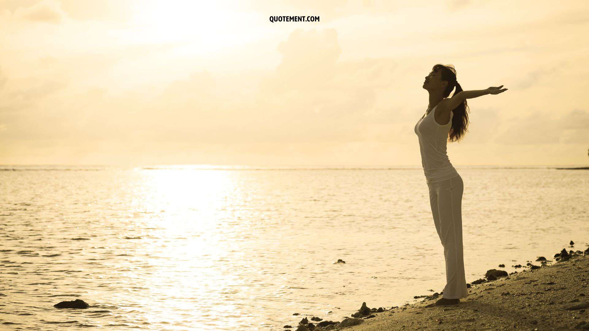 woman standing on the shore