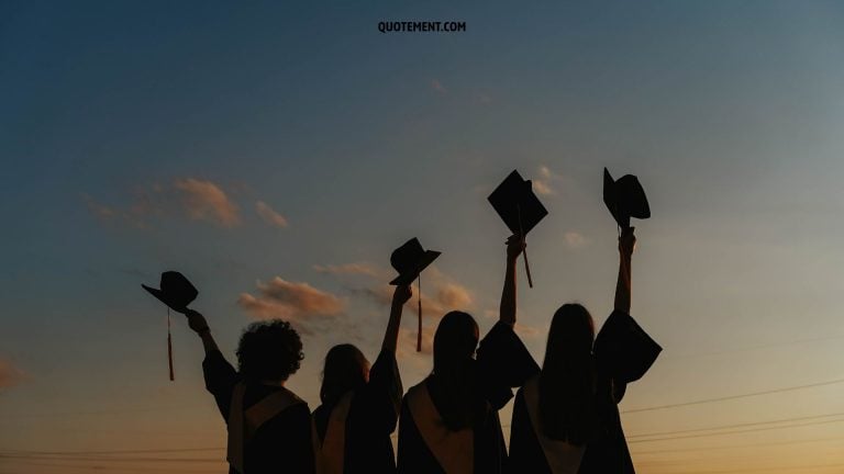 seniors holding up their caps